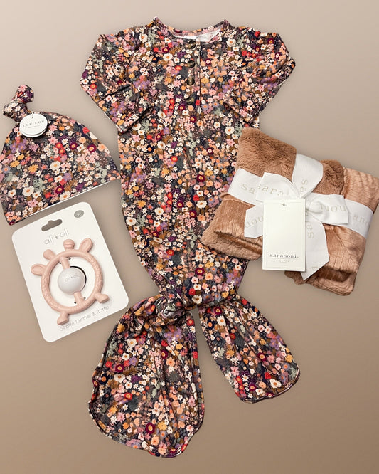 Gracie Gown and hat from lou lou & company, giraffe rattle teething toy and soft pink saranoni mini lovey.