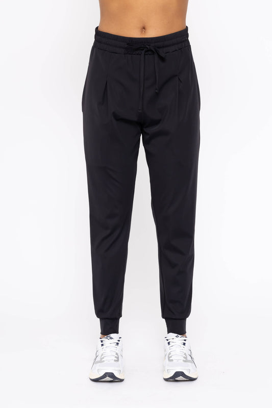 Black jogger pants worn by a woman lightweight material active lounge pant