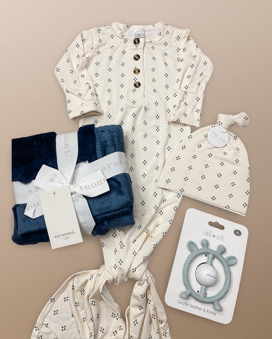 Louie Gown and top knot hat from lou lou & company paired with saranoni lovey navy mini blanket and giraffe teether